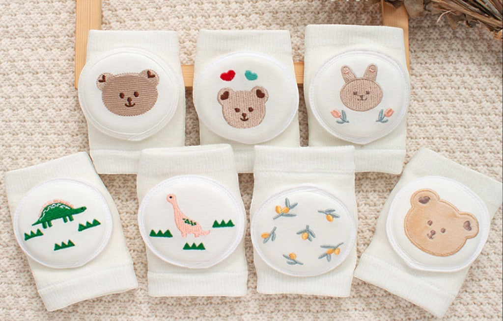 kainchhi baby knee pads with cute animal embroidery, breathable cotton blend, protects knees during crawling and walking.