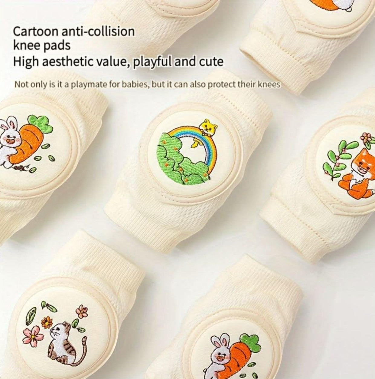 kainchhi baby knee pads with cute animal embroidery in cream cotton blend, featuring rabbits, cats, foxes, and rainbows.